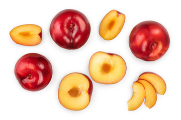 fresh red plum and half isolated on white background. Top view. Flat lay. Set or collection