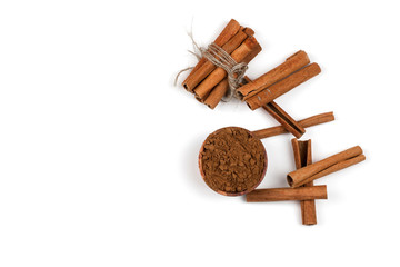 Cinnamon sticks and powder, isolated on white background