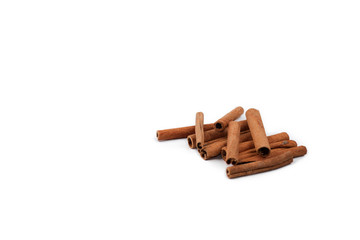 Cinnamon sticks and powder, isolated on white background