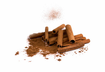Cinnamon sticks and powder, isolated on white background