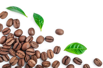 Heap of roasted coffee beans with leaves isolated on white background with copy space for your text. Top view. Flat lay.