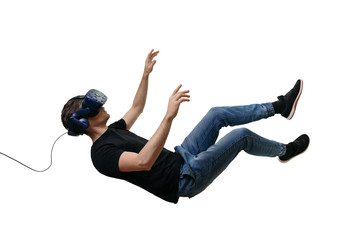 Isolated young men falling in zero gravity space while using virtual reality glasses on white...