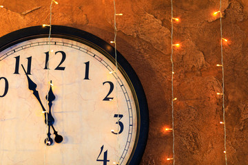 Countdown to midnight. Retro style clock counting last moments before Christmas or New Year  - Image