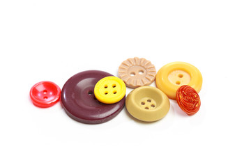 Fototapeta premium Buttons for clothes on white background using for concept of Button Day. - Image