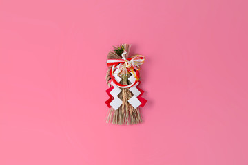 Japan's New Year ornament on pink background.