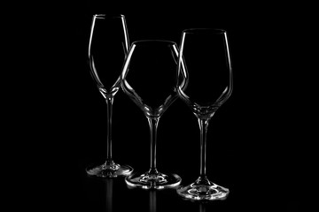 empty wine glasses on black  background