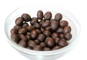 Chocolate peanuts. Nuts. Dessert. Brown color. Cocoa.