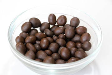 Chocolate peanuts. Nuts. Dessert. Brown color. Cocoa.