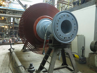 Power generator steam turbine in repair process, machinery, pipes, tubes at power plant