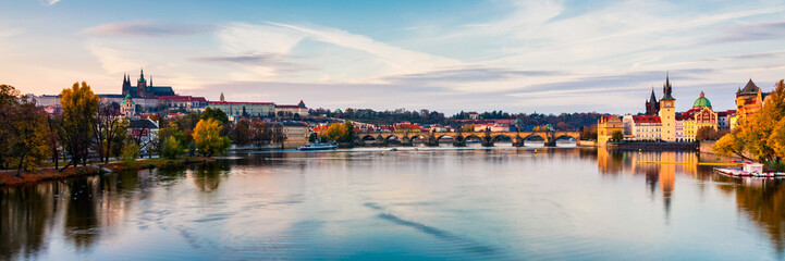 Autumn view to Charles bridge on Vltava river in Prague, Czech Republic. Autumn view to Charles...