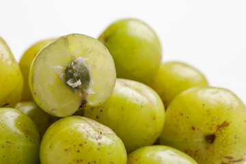 Fresh Indian gooseberry in wooden  bowl 