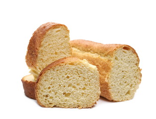 Corn and wheat flour bread loaf with slices isolated on white background