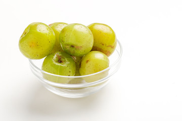 Fresh Indian gooseberry in glass bowl 