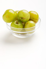 Fresh Indian gooseberry in glass bowl 