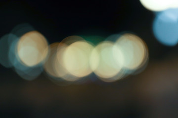 Color bokeh of warm light bulbs without focus, defocus