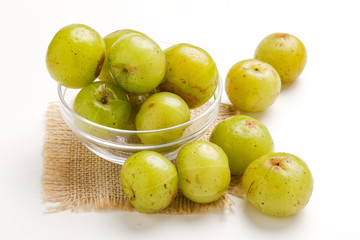Fresh Indian gooseberry in glass bowl 