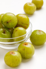 Fresh Indian gooseberry in glass bowl 
