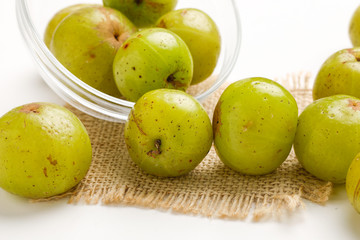 Fresh Indian gooseberry in glass bowl 