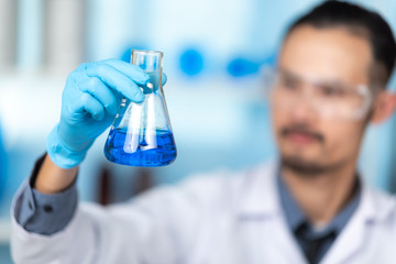 Health care researchers working in life science laboratory
