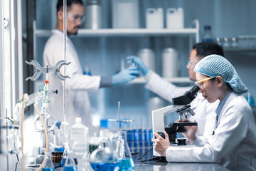 Health care researchers working in life science laboratory