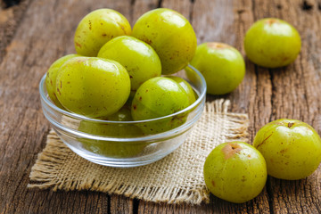 Fresh Indian gooseberry in glass bowl 