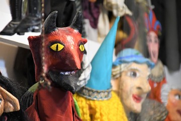 Beautiful devil's wooden marionette or puppet
