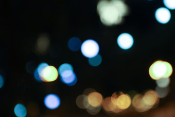 Color bokeh of warm light bulbs without focus, defocus