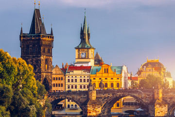 Charles Bridge in Prague in Czechia. Prague, Czech Republic. Charles Bridge (Karluv Most) and Old Town Tower. Vltava River and Charles Bridge. Concept of world travel, sightseeing and tourism.