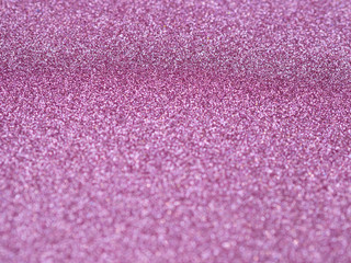 purple shiny glitter texture with selective focus metallic effect