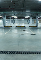 Vertical image of empty underground parking lot
