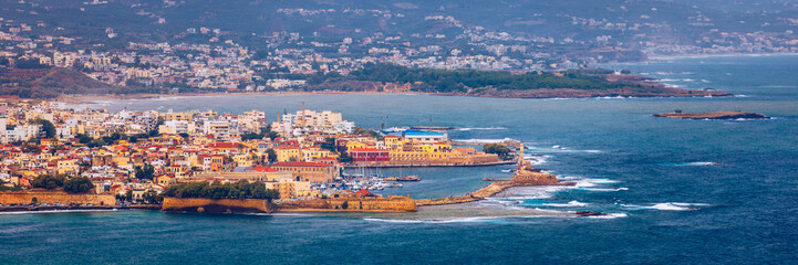 Picturesque old port of Chania. Landmarks of Crete island. Greece. Bay of Chania at sunny summer day, Crete Greece. View of the old port of Chania, Crete, Greece. The port of chania, or Hania.