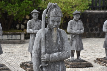 Fototapeta na wymiar Soldier with Sword Statue, Foreground, Tomb of Khai Dinh, Vietnam