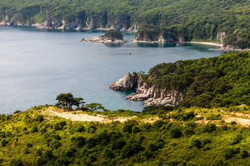 Beautiful sea bay, seascape with pine trees near peninsula Gamow, Russia, Primorsky krai
