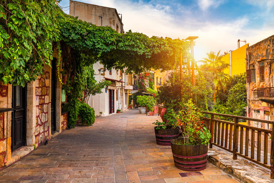 Fototapeta Street in the old town of Chania, Crete, Greece. Charming streets of Greek islands, Crete. Beautiful street in Chania, Crete island, Greece. Summer landscape. Chania old street of Crete island Greece.