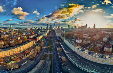 Beautiful panoramic aerial drone view to the Сenter of modern Warsaw city with silhouettes of...
