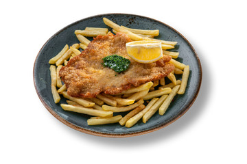 Delicious fried crispy schnitzel with potatoes
