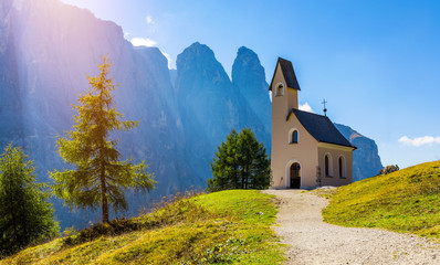 Chapel of San Maurizio at Passo Gardena, South Tyrol, Italy.  View to path to small white chapel...