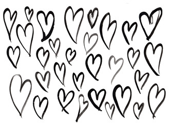 Set of hand-drawn black hearts isolated on a white background. Empty contour hearts drawn by black paint with one brush stroke in grunge style. Can be used as a frame for decorating a love card.
