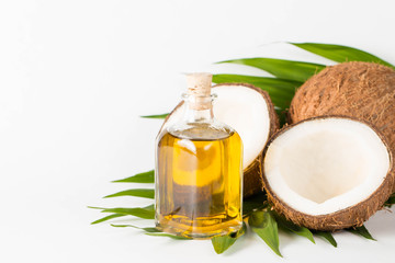 Ripe half cut coconut on a wooden background. Ripe half cut coconut on a wooden background. Coconut cream and oil.