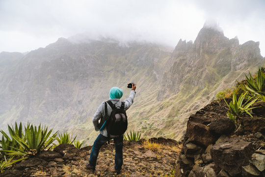 Santo Antao Island, Cape Verde. Travel hiker making picture of arid mountain top in surreal Xo Xo valley