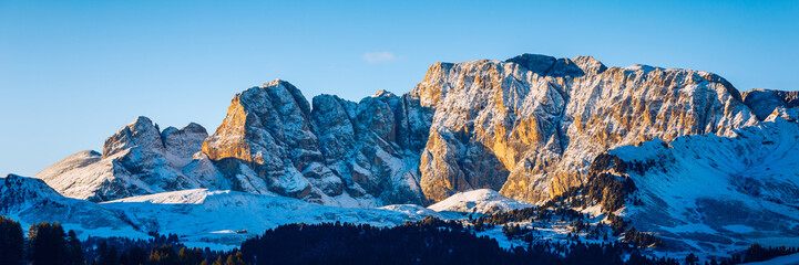 Alpe di Siusi or Seiser Alm with Sassolungo, Langkofel mountain group in background. Alpe di Siusi...