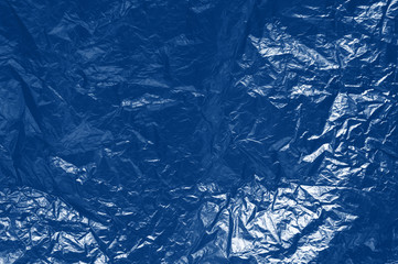 background of crumpled paper. Classic blue toning trend 2020 year color