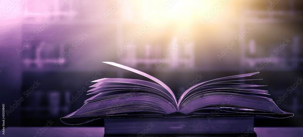 Poster stack of books in the library and blur bookshelf background