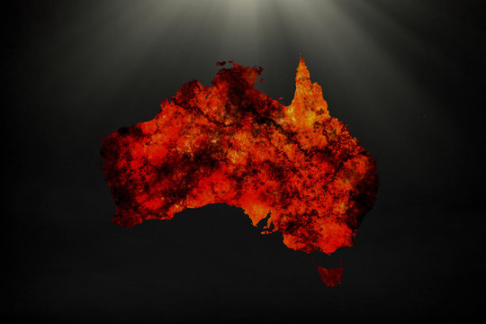 Map of Australia made with fire texture on black background