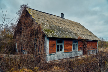 A terrible mysterious apocalyptic view: an abandoned house in the abandoned Belarusian Kovali...
