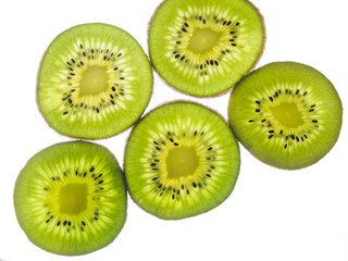 Fototapeta premium round kiwi slices on a white background. Isolated on white