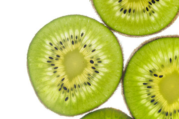 Fototapeta na wymiar round kiwi slices on a white background. Isolated on white