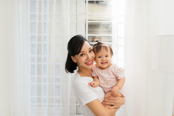Happy Mother and daughter hugging