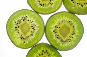 round kiwi slices on a white background. Isolated on white