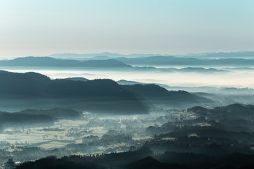 Foggy morning mountain landscape in Slovenia